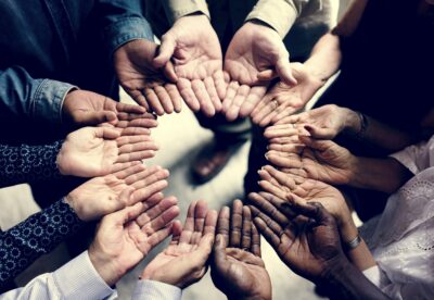 Group of diverse hands in a circle